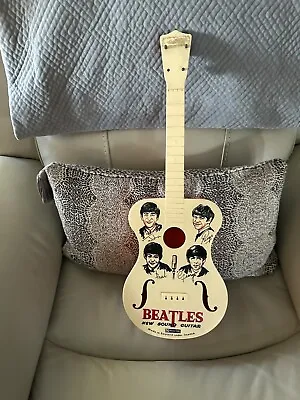 Beatles New Found Toy Guitar  • $1