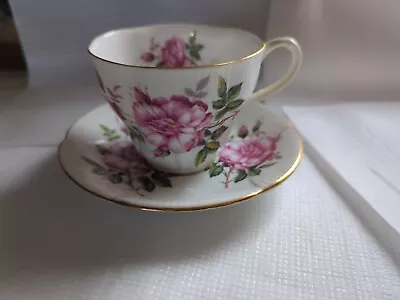Vintage ROYAL ALBERT White Pink Roses Footed Tea Cup & Saucer Bone China England • $19.99