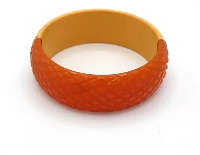 BKL347	Vintage Two Tone Bakelite Carved Orange Cream Bangle Bracelet • $29.95