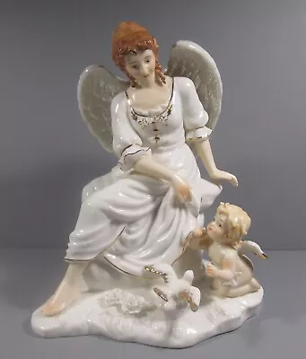 Grandeur Noel O'Well  Angel With Cherub And Dove  Porcelain Figurine • $9