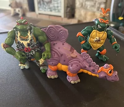 Teenage Mutant Ninja Turtles Cave Turtles Raphael Michelangelo & Stegosaurus  • $24.99