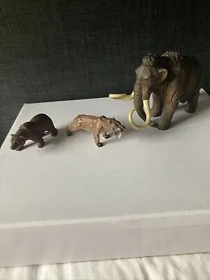 Wooly Mammoth Sabre Tooth Tiger And Grizzly Bear Animal Figurines • £25