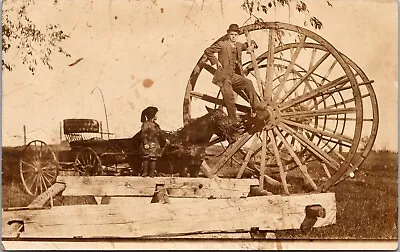 Man Posing On Big Wheel Michigan Logging RPPC Postcard • $12.99