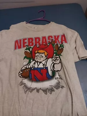 Vintage 90’s University Of Nebraska Cornhuskers Break Through Graphic T-shirt  • $14