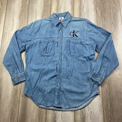 $24.84 • Buy VINTAGE Calvin Klein Shirt Mens Small Blue Chambray Embroidered Oversized USA