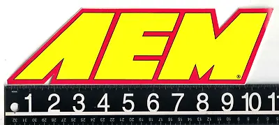 AEM PERFORMANCE STICKER Red/Yellow Motorsport Decal 10.5 In X 3.2 In • $5.95