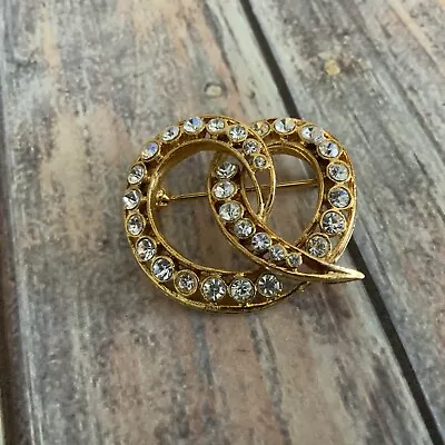 Vintage Clear Rhinestone Curled Pretzel Brooch In Gold Tone Metal  • $10