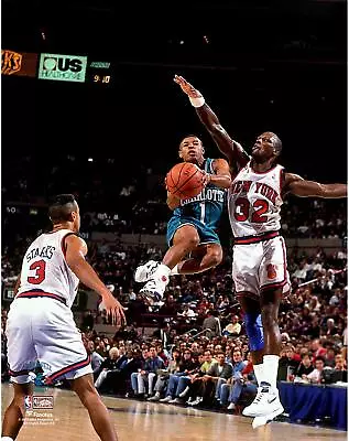 Muggsy Bogues Hornets Unsigned Teal Jersey Mid-Air Vs New York Knicks Photo • $14.99