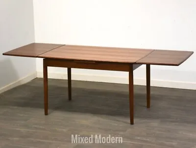 Danish Modern Teak Draw Leaf Dining Table • $1900