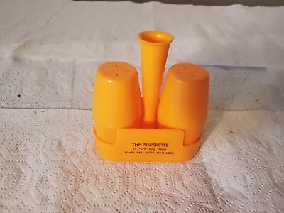 Orange Plastic Salt & Pepper Shakers The Superette La Porte City Iowa Loeb  • $7.99