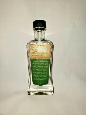Vintage 2 Oz Clear Glass Vaseline Hair Tonic Bottle  Green And Off White Label • $11.24