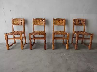 Set Of Four Woven Leather And Oak Dining Chairs • $3800