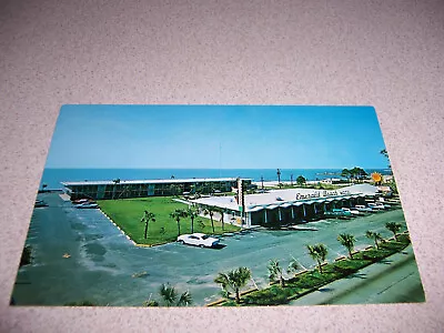 1960s PARKING LOT VIEW EMERALD BEACH MOTEL BILOXI MS. VTG POSTCARD • $3.99