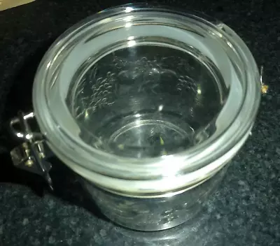 VINTAGE CLEAR PLASTIC CANISTER 5.5H With RAISED DESIGNS • $5.96