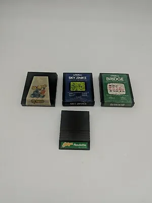 Q-bert Atari 2600 1983 Arcade Video Game Cartridges Lot Of 4 Mixed Not Tested • $15.80