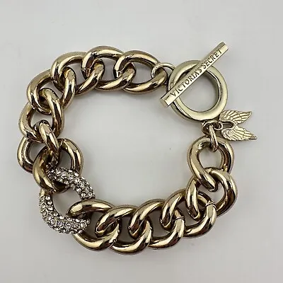 6.5” Victoria’s Secret Gold Tone Curb Chain Wings Charm Crystal Accent Bracelet • $10