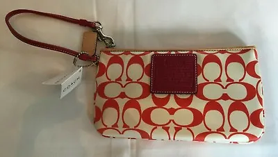 COACH Peyton Red And White Wristlet NWT Measures: 8” L X 4.5” W • $35