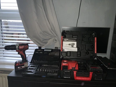 £150 • Buy Milwaukee M18 Cordless Combi Drill Set With A Dewalt 109 Piece Set