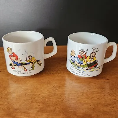 2 Vtg Childs Nursery Rhyme Cup Mug Tom The Pipers Son & Rub A Dub Dub Woods  Son • $18