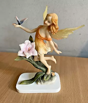 Orange Fairy Figure Holding Butterfly • £6.95