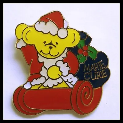 Marie Curie Cancer Care Charity Pin Badge Bear Santa Sleigh • £2.99
