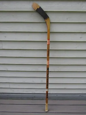 Vintage WOODEN Right Handed Hockey Stick LOUISVILLE BOMBER 2310  Measures 54  • $9.92