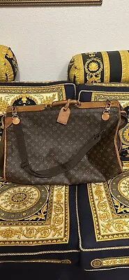 Louis Vuitton Monogram Garment Bag • $875