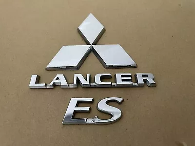 FREE SHIPPING OEM 2004-2007 Mitsubishi Lancer ES Emblem Badge Set • $19.99