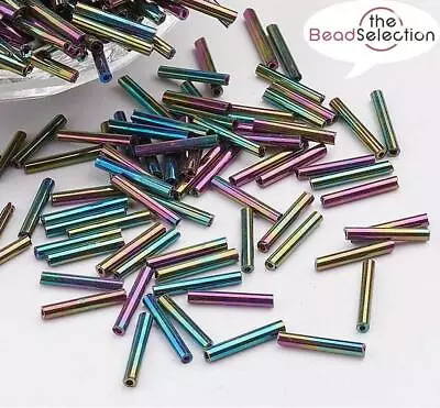 50g METALLIC AB RAINBOW GLASS BUGLE BEADS LONG 9mm X 2mm • £2.99